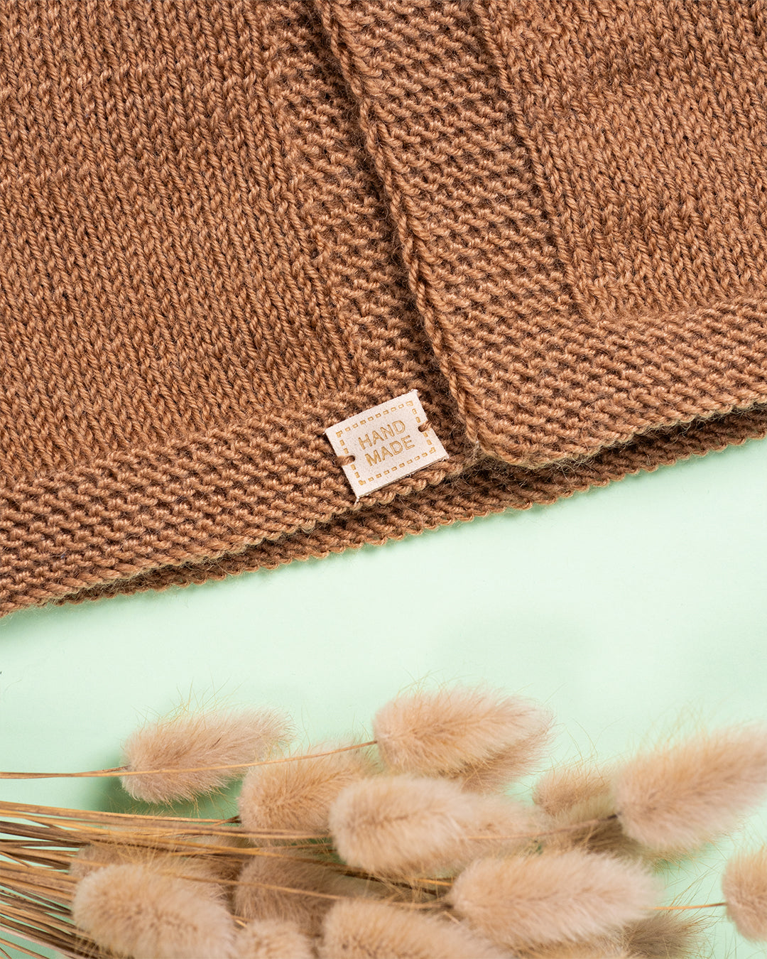 RJAVI TELOVNIK Z ROŽICO (1-4mesece)